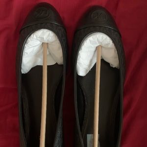 New never wore Michael Kors flats size 11